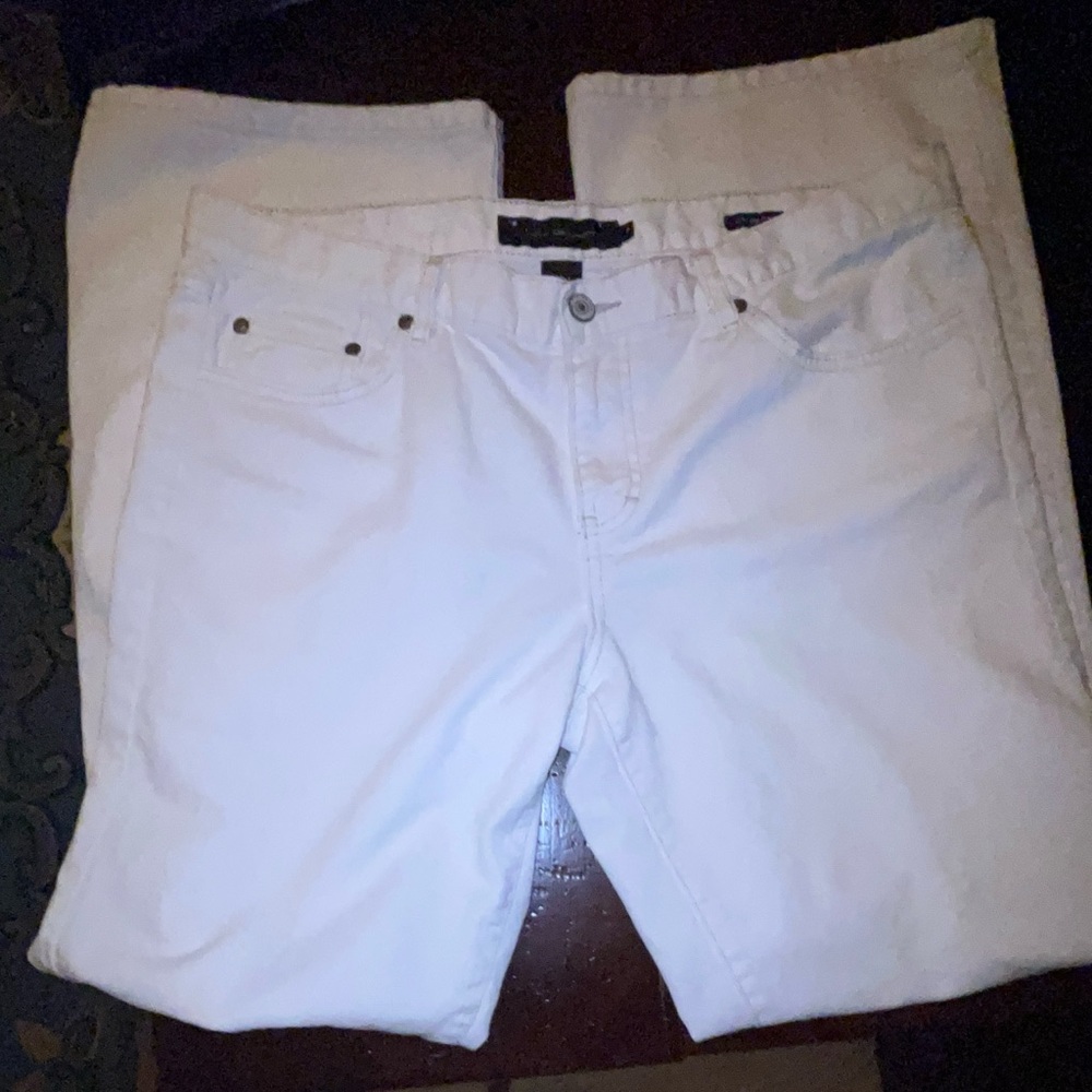 White,99% cotton size 14. Calvin Klein jeans. No stretch.